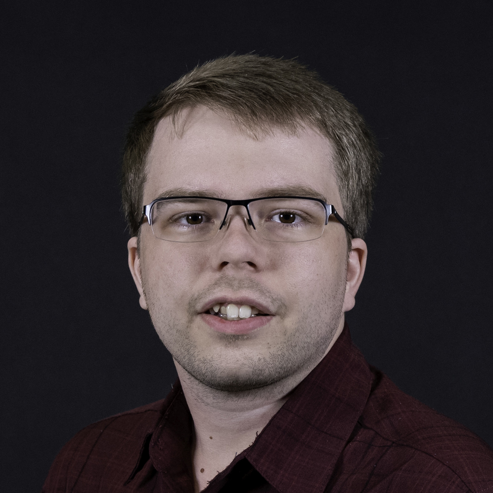 Headshot of Alex Ball
